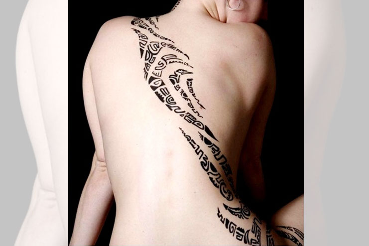 Female back tattoo
