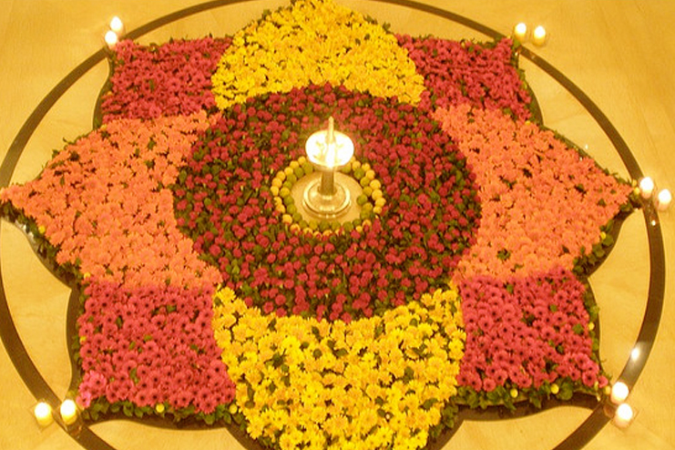 Full flowers in a rangoli and diyas