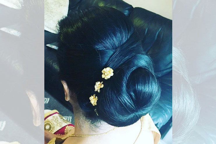 Criss criss accentred bun with flowers