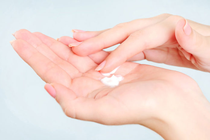 Applying hand cream