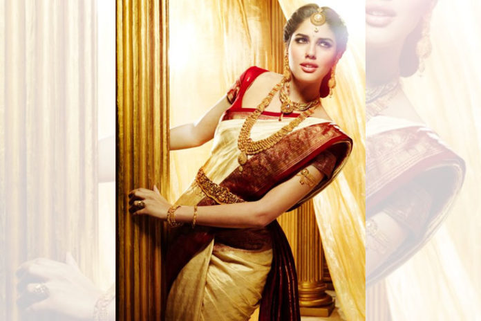 Gold saree with red blouse