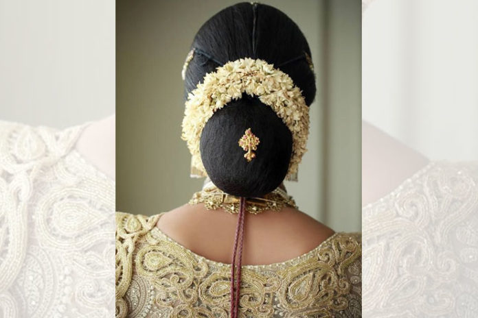 Low bun with simple jasmine gajra