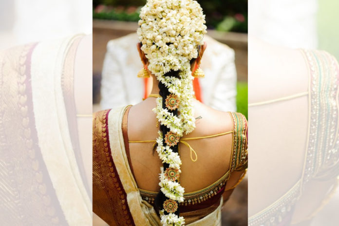 Braid with layered jasmine flower