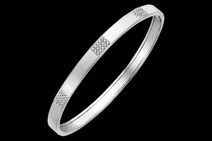 Diamond engraved platinum bangle