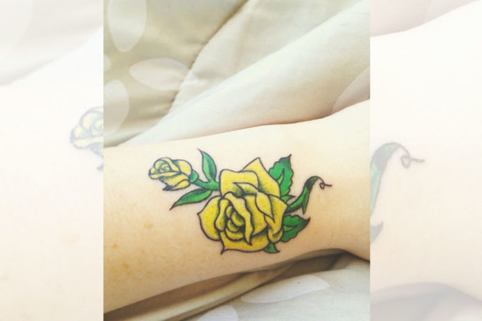 Yellow rose tattoo