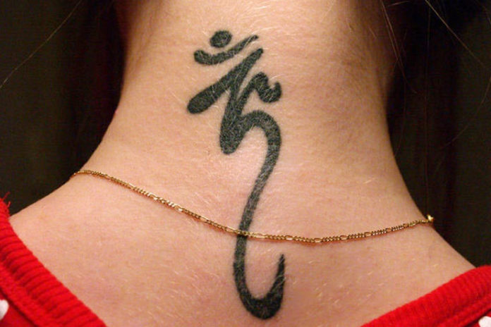 Om neck tattoo