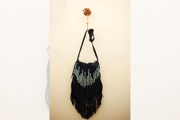 Handmade handbag with tassels