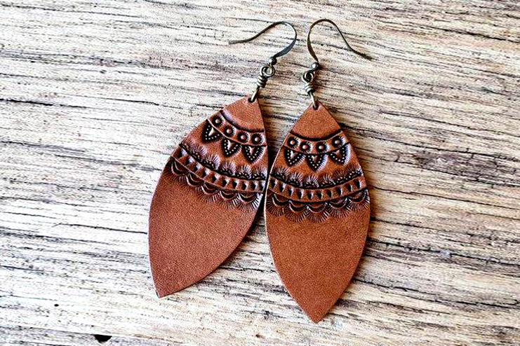 Carved leather earrings