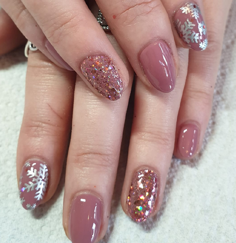 Peach nails with snowflakes