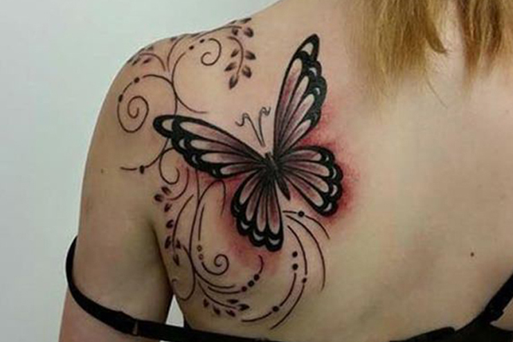 Butterfly-tattoo-with-spiral-designs