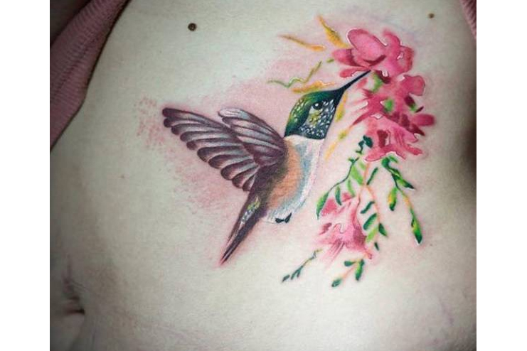 Hummingbird-stuck-to-flower-tattoo